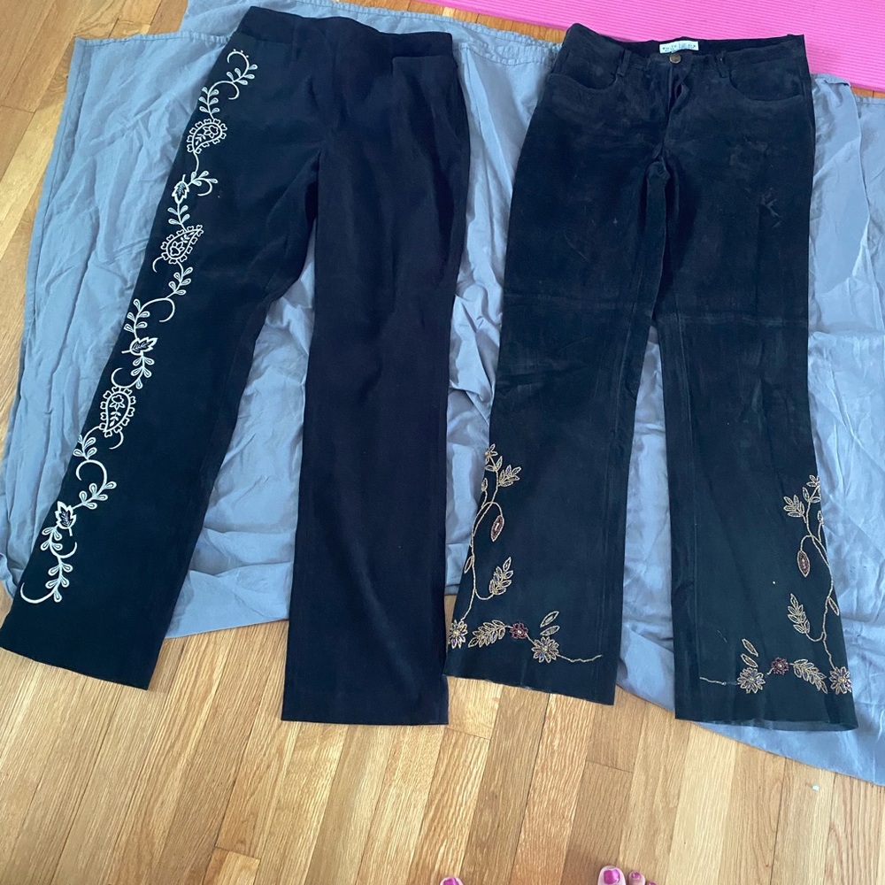 2 pair of embroidered pants. One is suede, the other maybe a light velour